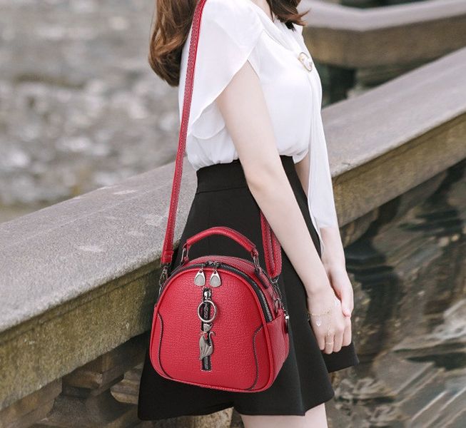 Маленька дитяча сумочка з брелком, міні сумка для дівчаток з брелочком 1062Д фото